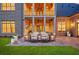 Outdoor patio features a dining table and lush green lawn at 4927 Slaton Drive, Acworth, GA 30101
