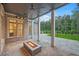 Outdoor patio with stone flooring, fireplace, and view of the backyard at 4927 Slaton Drive, Acworth, GA 30101