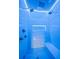 Luxurious shower with dual showerheads, a built-in bench, and a tiled accent wall, perfect for a spa-like experience at 4927 Slaton Drive, Acworth, GA 30101