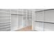 Expansive walk-in closet with custom shelving and drawers, perfect for a well-organized wardrobe and storage solutions at 4927 Slaton Drive, Acworth, GA 30101