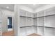 Spacious walk-in closet with custom shelving and ample storage, perfect for organizing your wardrobe at 4927 Slaton Drive, Acworth, GA 30101