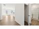 Hallway view leading into a bathroom with a walk-in shower at 5391 Heron Bay Blvd, Locust Grove, GA 30248