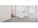 Hallway with carpet leading to upstairs bedrooms at 5391 Heron Bay Blvd, Locust Grove, GA 30248