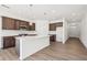 Spacious kitchen with stainless steel appliances, granite counters, and island at 5391 Heron Bay Blvd, Locust Grove, GA 30248