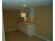 Small basement kitchen with white cabinets at 295 Flagstone Way # 295, Austell, GA 30168