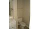Small half bathroom with toilet and vanity at 295 Flagstone Way # 295, Austell, GA 30168