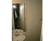 Small bathroom with pedestal sink and mirror at 295 Flagstone Way # 295, Austell, GA 30168