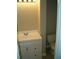 Small bathroom with white vanity and toilet at 295 Flagstone Way # 295, Austell, GA 30168