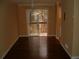 Dining room with hardwood floors and sliding glass door to deck at 295 Flagstone Way # 295, Austell, GA 30168