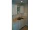 White kitchen with double sink, dishwasher, and window at 295 Flagstone Way # 295, Austell, GA 30168