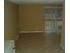 Spacious living room with tile floor and sliding door at 295 Flagstone Way # 295, Austell, GA 30168