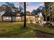 Expansive backyard with ample seating and windows offering generous light at 9650 Coleman Rd, Roswell, GA 30075
