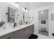 Bathroom featuring dual sinks, modern fixtures, and a spacious walk-in shower at 9650 Coleman Rd, Roswell, GA 30075
