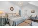 Bedroom with chandelier, furniture, and view to attached bath at 9650 Coleman Rd, Roswell, GA 30075