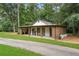 Charming detached garage with covered parking and landscaping at 9650 Coleman Rd, Roswell, GA 30075