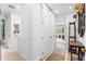Hallway with lots of linen closet space and stylish decor at 9650 Coleman Rd, Roswell, GA 30075