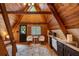 Charming interior showcasing wood-clad walls, bright kitchenette and cozy decor, exuding rustic elegance at 9650 Coleman Rd, Roswell, GA 30075