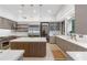 Modern kitchen with sleek countertops, custom cabinetry, and stainless steel appliances, perfect for culinary enthusiasts at 9650 Coleman Rd, Roswell, GA 30075