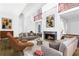 Spacious living room boasting a fireplace, high ceilings, and modern decor at 9650 Coleman Rd, Roswell, GA 30075