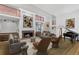 Elegant living room with a fireplace, piano, and contemporary furnishings at 9650 Coleman Rd, Roswell, GA 30075