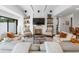 Cozy living room with fireplace, built-in shelves, and comfortable seating at 9650 Coleman Rd, Roswell, GA 30075