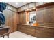 Spacious walk-in closet with custom cabinetry, drawers, and ample storage at 9650 Coleman Rd, Roswell, GA 30075