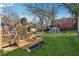 Backyard featuring a deck, shed, trees and a garden at 67 Holly Nw Rd, Atlanta, GA 30314