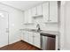 Stylish kitchen featuring stainless steel appliances, white cabinets and granite countertops at 67 Holly Nw Rd, Atlanta, GA 30314