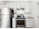 Well-appointed kitchen with stainless steel appliances and modern cabinetry at 67 Holly Nw Rd, Atlanta, GA 30314