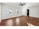 Spacious open room featuring hardwood floors and neutral paint, ready for your personal touch at 67 Holly Nw Rd, Atlanta, GA 30314