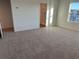 Spacious carpeted bedroom with a bathroom, great natural light, and neutral paint at 2120 Boxwood Se Cir, Conyers, GA 30094