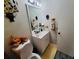 Bathroom with vanity, toilet, and updated fixtures at 2382 Old Rex Morrow Rd, Ellenwood, GA 30294