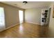 Bright and airy bedroom with light wood floors at 2382 Old Rex Morrow Rd, Ellenwood, GA 30294