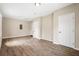 Expansive bonus room featuring durable wood-look floors and great potential as a flex space at 2382 Old Rex Morrow Rd, Ellenwood, GA 30294