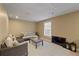 Finished basement area featuring a comfortable sitting area at 610 Ashwood Ct, Woodstock, GA 30189