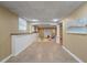 Finished basement play area with neutral walls and tile flooring at 610 Ashwood Ct, Woodstock, GA 30189