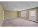 Finished basement recreation room with neutral walls and carpet at 610 Ashwood Ct, Woodstock, GA 30189