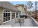 Deck with seating area and views of backyard at 610 Ashwood Ct, Woodstock, GA 30189