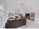 Spacious living room featuring a fireplace and built-in shelving at 610 Ashwood Ct, Woodstock, GA 30189