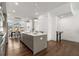 Modern kitchen with gray cabinetry, island, and hardwood floors at 1036 Culpepper Nw St, Atlanta, GA 30318