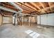 Unfinished basement with high ceilings and plenty of storage space at 3860 Wisteria Sw Ln, Atlanta, GA 30331