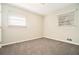 Bedroom with neutral carpeting and ample natural light at 3860 Wisteria Sw Ln, Atlanta, GA 30331