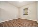 Well-lit bedroom with hardwood floors and neutral walls at 3860 Wisteria Sw Ln, Atlanta, GA 30331