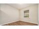 Bright bedroom with hardwood floors and large window at 3860 Wisteria Sw Ln, Atlanta, GA 30331