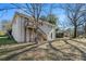 House exterior showcasing backyard and landscaping at 3860 Wisteria Sw Ln, Atlanta, GA 30331