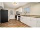 Modern kitchen with granite countertops and stainless steel appliances at 3860 Wisteria Sw Ln, Atlanta, GA 30331