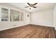 Bright living room with hardwood floors and ceiling fan at 3860 Wisteria Sw Ln, Atlanta, GA 30331