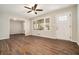 Bright living room with hardwood floors and ceiling fan at 3860 Wisteria Sw Ln, Atlanta, GA 30331