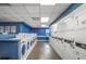 Bright laundry room with multiple washers and dryers for residents at 620 Peachtree Ne St # 1206, Atlanta, GA 30308