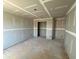 Spacious bedroom showing new construction with drywall installed, awaiting final finishes at 628 Gilles Ln, Cumming, GA 30041